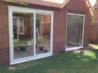 Sliding panels for patio doors